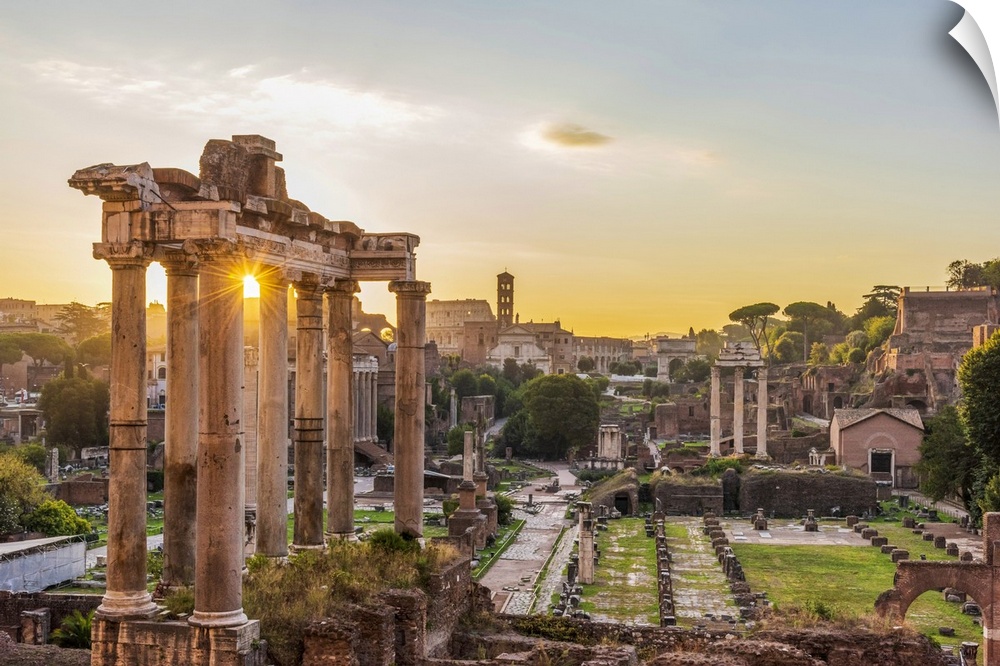 Europe, Italy, Rome. The Forum Romanum with the temple of Saturn at sunrise.