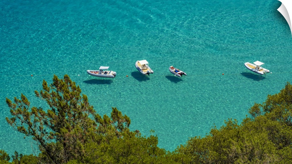 Europe, Italy, Sardinia. View of the boats in Cala Luna.