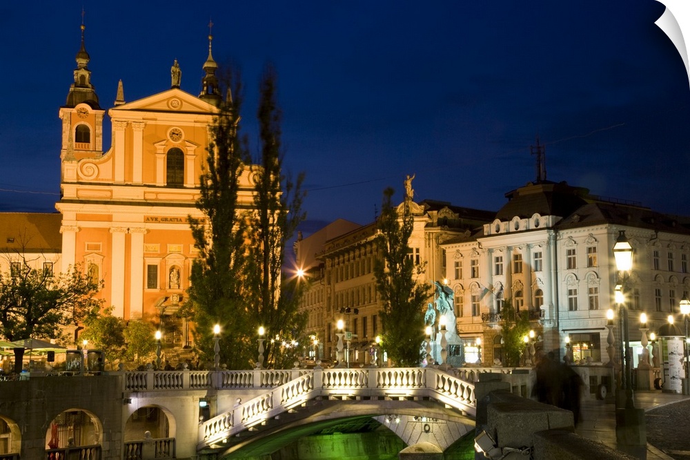 Evening view of Franciscan Church, Presernov Trg Square and Triple Bidge, Ljubljana, Slovenia