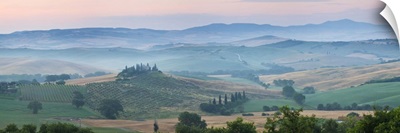 Farmhouse in valley at daybreak, Val d' Orcia, Tuscany, Italy
