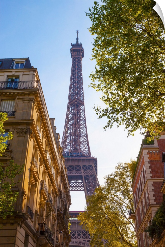 France, Paris, Eiffel Tower, view through street.
