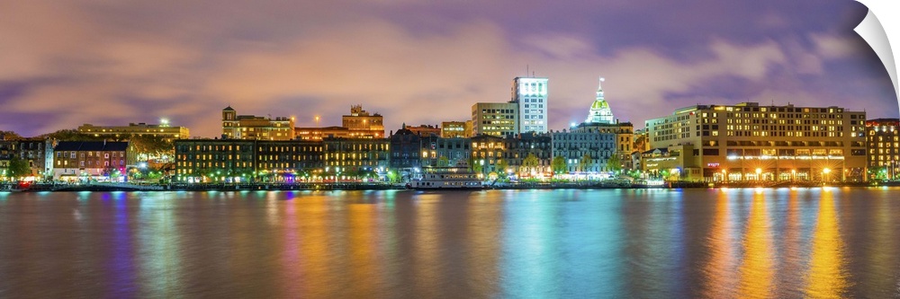 USA, Georgia, Savannah, Skyline reflected in the Savannah river.