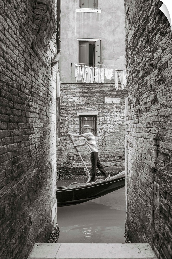 Gondola on a small canal, Cannaregio, Venice, Veneto, Italy.
