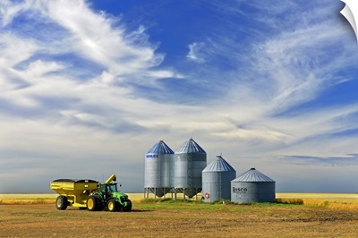 Grain Bins And Cart In Lentil Field, Lang, Saskatchewan, Canada