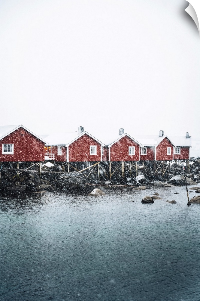 Hamnoy village with snowflakes, Reine Bay, Lofoten Islands, Nordland, Norway.