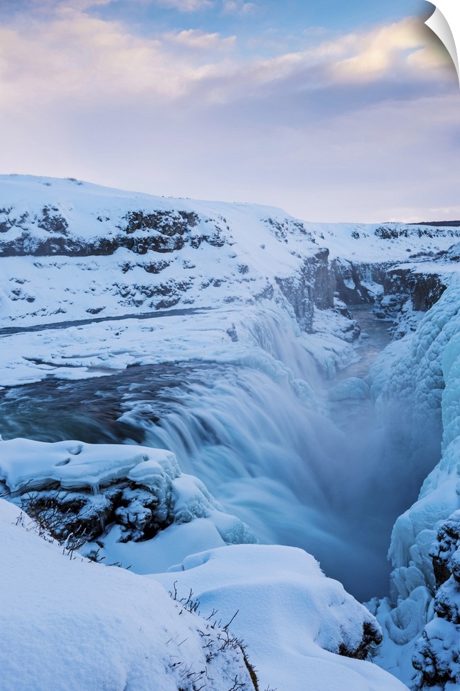 Iceland, Europe. Frozen Gullfoss waterfall in wintertime.