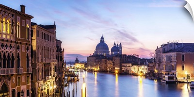 Italy, Veneto, Venice. Santa Maria della Salute church and Grand Canal at sunrise