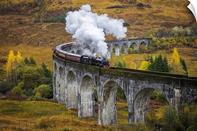 Jacobite Steam Train Crossing Glenfinnan Viaduct, Scottish Highlands, Scotland, UK