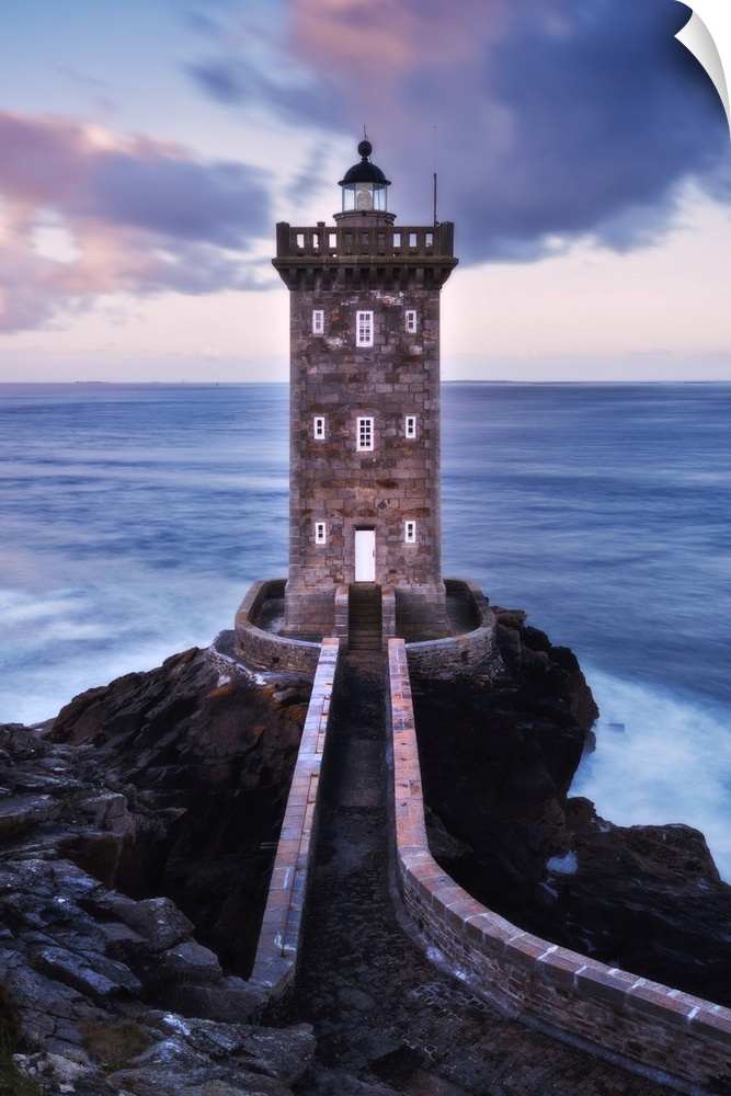 Kermorvan lighthouse at dawn in Brittany, France.