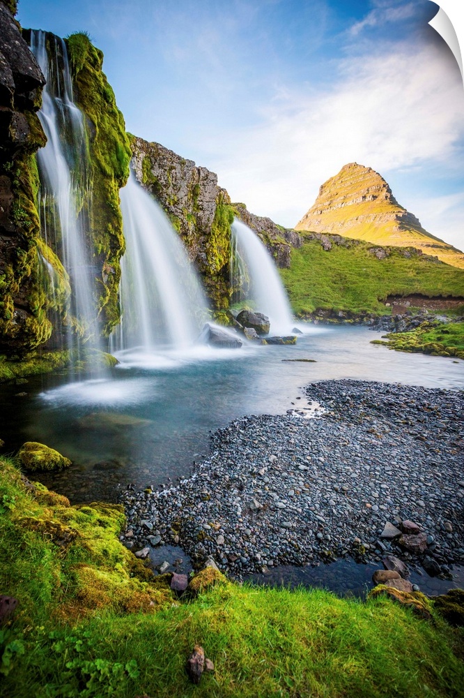 Kirkjufell Mountain, Snaefellsnes peninsula, Iceland. Landscape with waterfalls, long exposure on a sunny day.