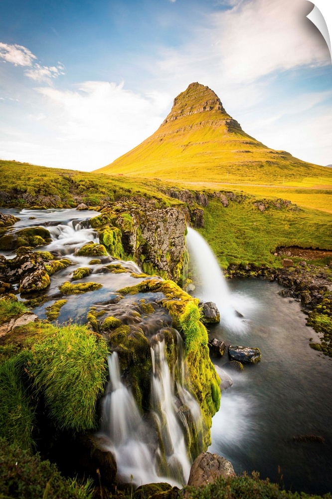 Kirkjufell Mountain, Snaefellsnes peninsula, Iceland. Landscape with waterfalls, long exposure on a sunny day.