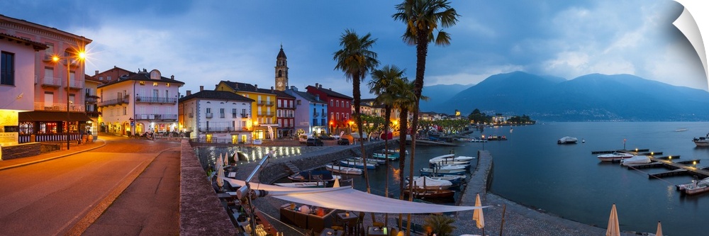 Ascona's picturesque Lakeside Promenade and Boat Harbour illuminated at Dusk, Ascona, Lake Maggiore, Canton of Ticino, Swi...