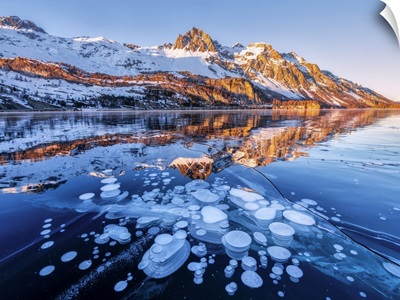 Lake Sils Covered Of Ice Bubbles At Sunset, Canton Of Graubunden, Engadine, Switzerland