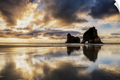 Lone Person On Wharariki Beach At Sunset, New Zealand