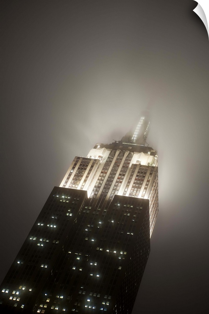 USA, New York City, Manhattan, Empire State Building on a rainy evening- low angle view