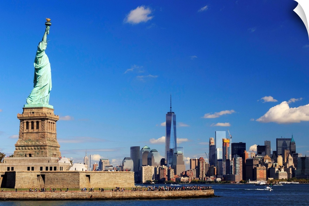 USA, New York, New York City, Statue of Liberty and Lower Manhattan Skyline.