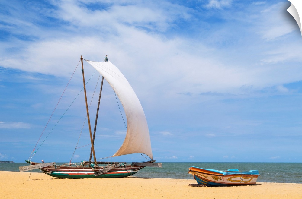Oruwa (outrigger canoe) on Negombo beach, Western Province, Sri Lanka.