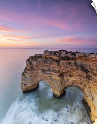 Panorama of cliffs framed by turquoise sea at dawn