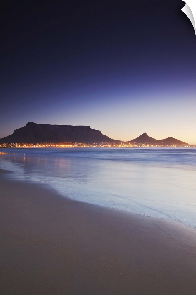 View of Table Mountain at sunset from Milnerton beach, Cape Town, Western Cape, South Africa