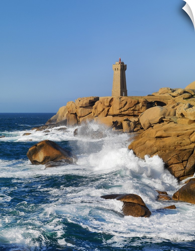 Ploumanach lighthouse on the Cote de Granit Rose (Pink Granite Coast), Cotes d'Armor, near Perros-Guirec, Brittany, France...