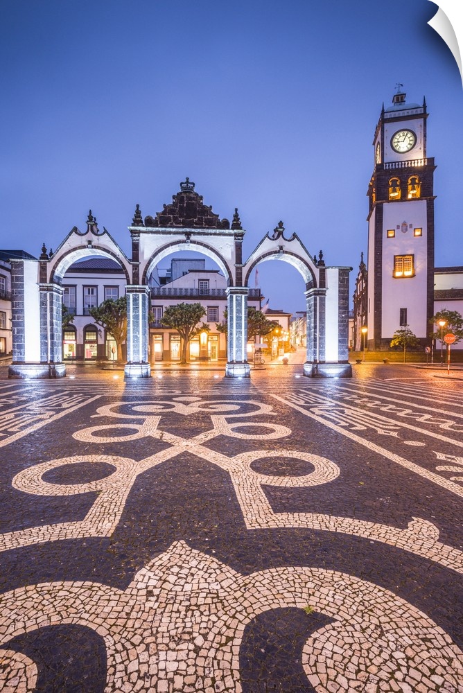 Portugal, Azores, Sao Miguel Island, Ponta Delgada, Portas da Cidade gate and the Igreja Matriz de Sao Sebastiao church