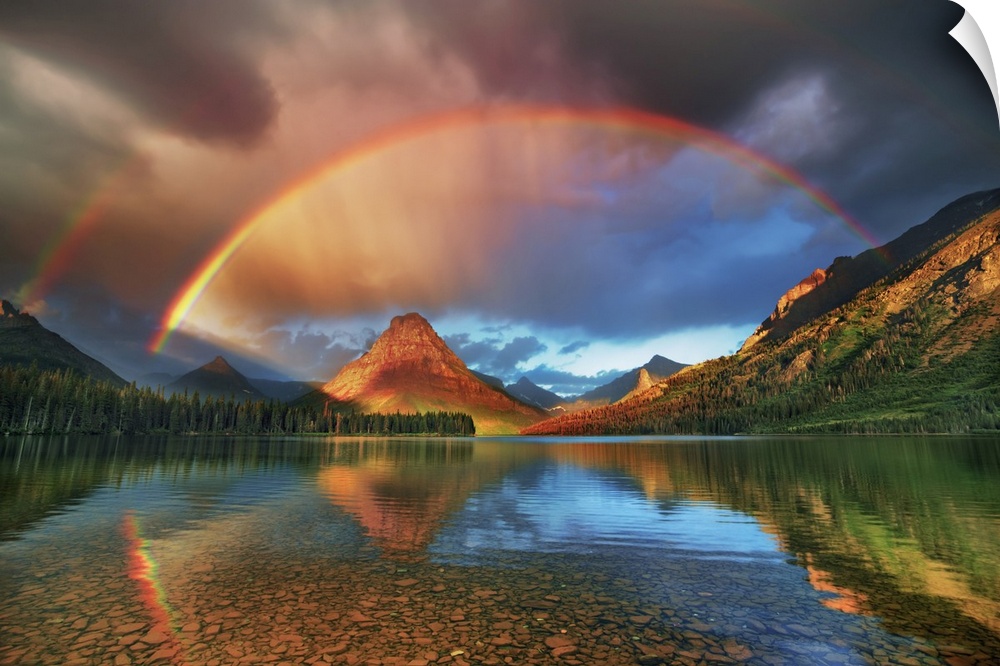 Rainbow at Two Medicine Lake with Sinopah Mountain. USA, Montana, Glacier National Park, Two Medicine Lake. Rocky Mountain...