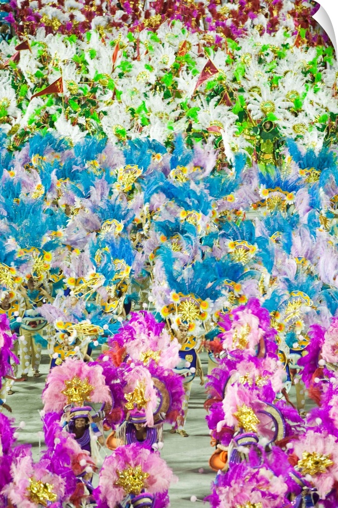 South America, Rio de Janeiro, Rio de Janeiro city, costumed dancers at carnival in the Sambadrome Marques de Sapucai