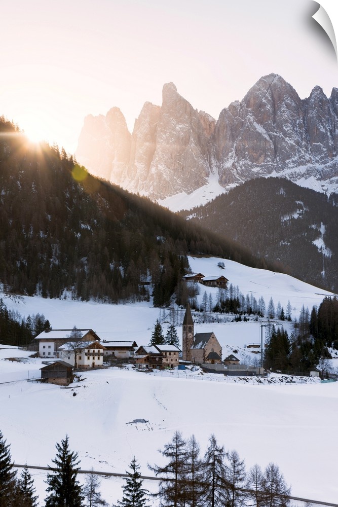 Sankt Magdalena in a winter sunrise in Funes valley, Odle Natural park in Trentino Alto Adige district, Italy, Bolzano pro...