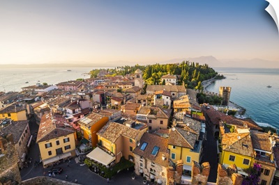 Sirmione, lake Garda, Lombardy, Italy. High angle view of the old town at sunset