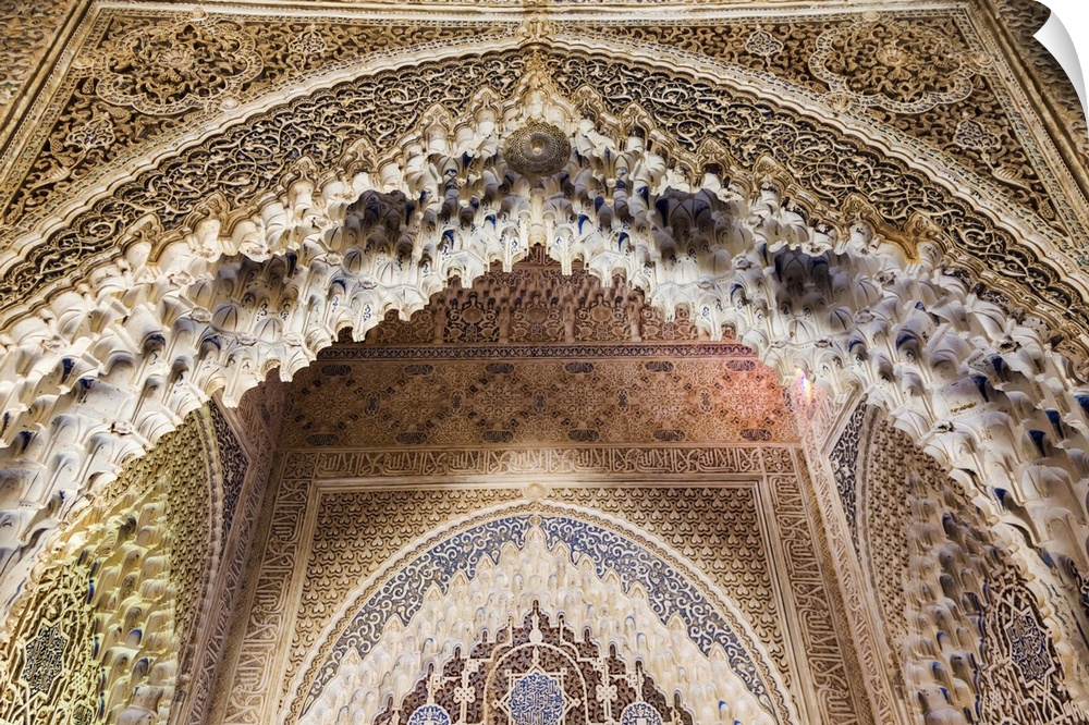 Spain, Andalusia, Granada. The Alhambra. Ornate arches inside the Alhambra