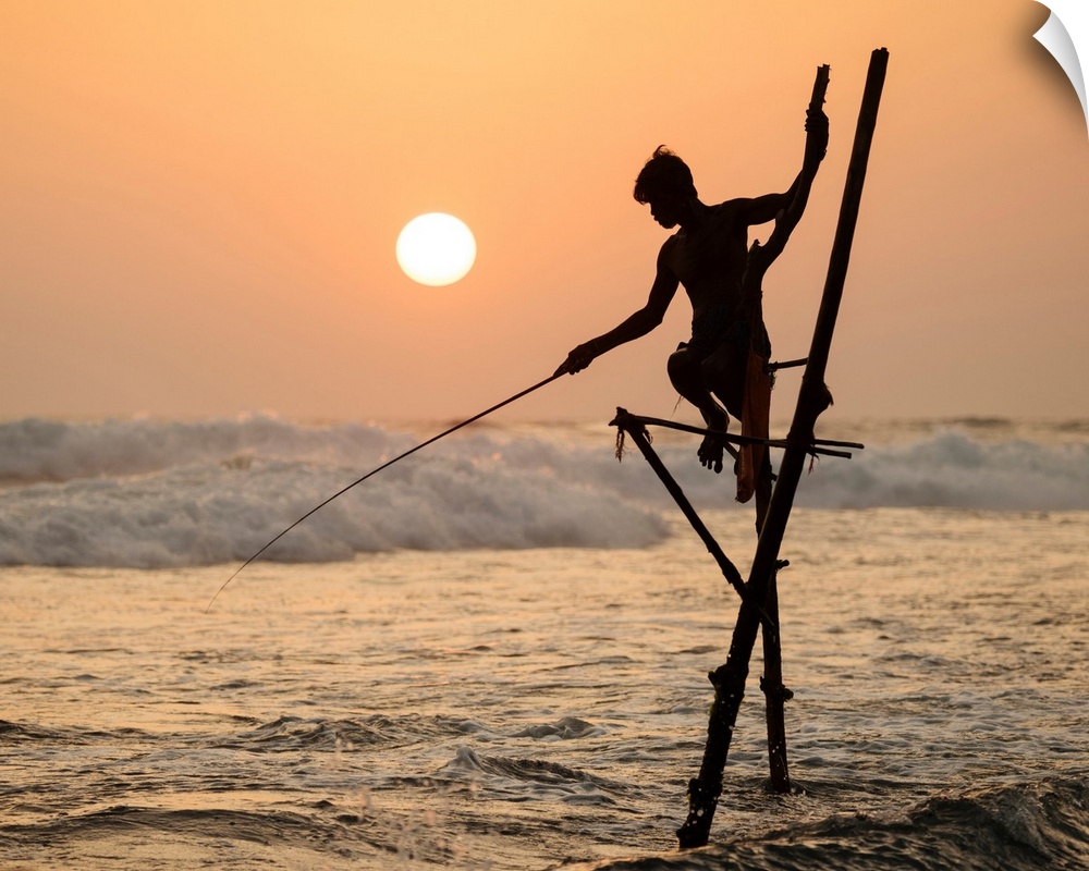 Stilt Fishermen At Dusk, Weligama, South Coast, Sri Lanka, Asia.