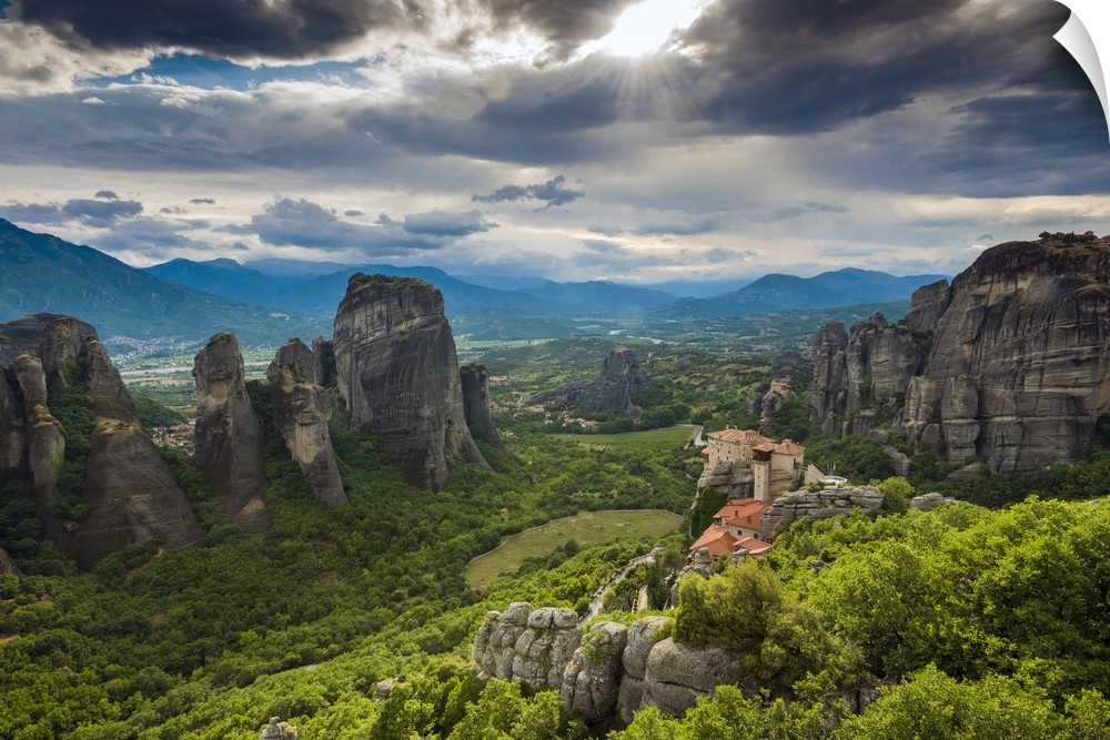Sunset view over Monastery of Moni Agias Varvaras Roussanou and the spectacular massive rocky pinnacles of Meteora, Thessa...
