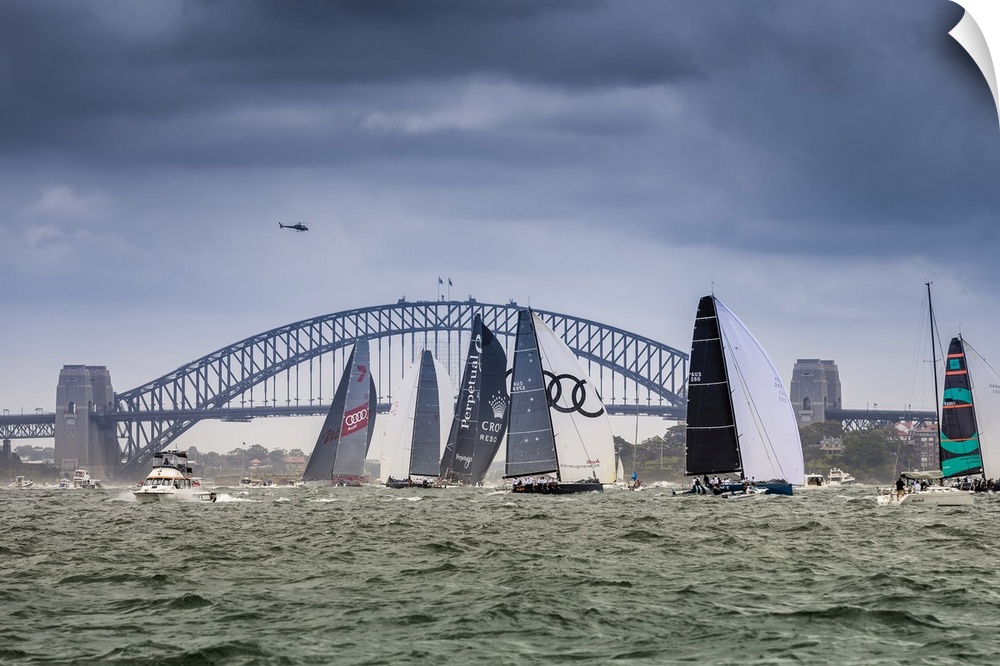 Super maxi yachts competing in the SOLAS Big Boat Challenge on Sydney Harbour, Sydney, New South Wales, Australia.