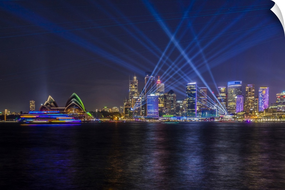 Sydney Opera House and skyline illuminated with projections and lasers during Sydney Solstice celebrations, Sydney, New So...