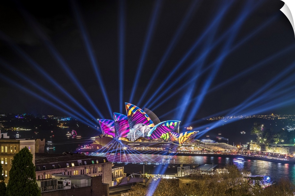 Sydney Opera House illuminated with lasers and projections during Vivid Sydney festival, Sydney, New South Wales, Australia.