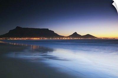 Table Mountain at dusk from Milnerton beach, Cape Town, South Africa