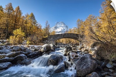 The River Cairasca And Monte Leone In The Background During Autumn, Piedmont, Italy