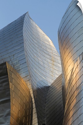Titanium-clad exterior of the Guggenheim museum at sunset, Bilbao, Biscay, Spain