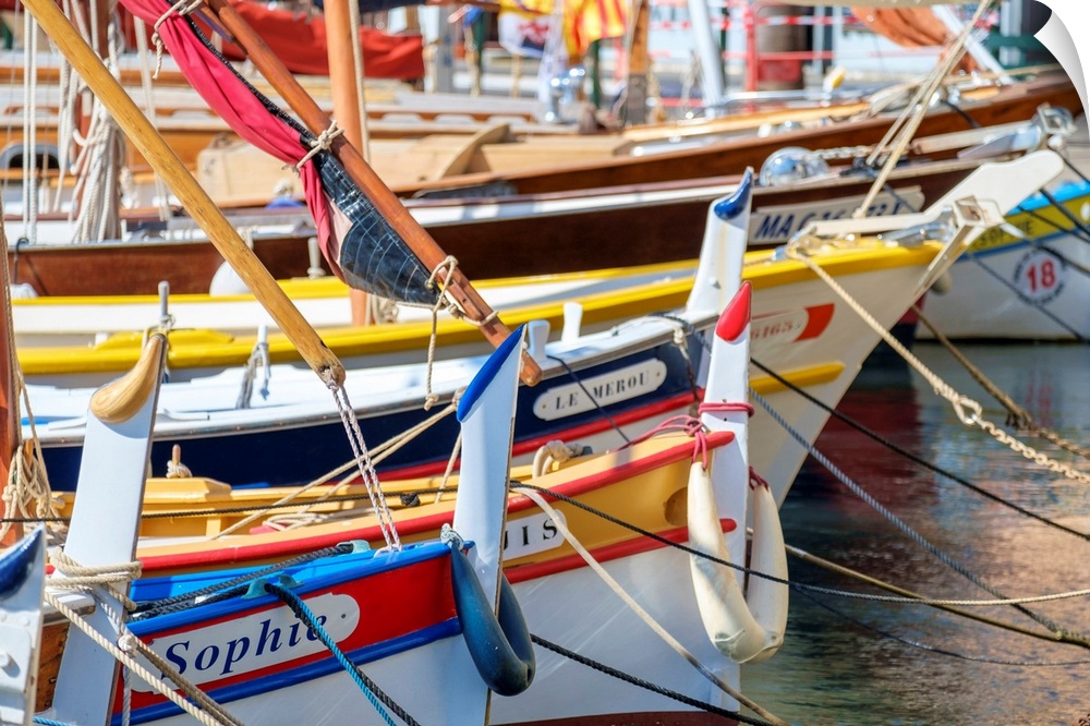 Traditional colorful wooden fishing boat in the port harbor at Sanary-sur-Mer, Var department, Provence-Alpes-Cote d'Azur,...