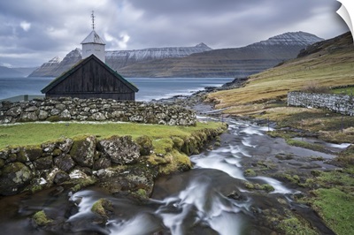Traditional Faroese wooden turf roofed church in the village of Funningur