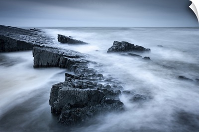 Twilight On The Rocky Shores Of Speke's Mill Mouth, On The North Devon Coast, England