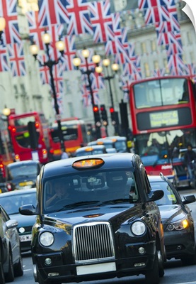 UK, England, London, Regent Street, Taxis and Union Jack Flags