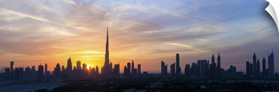 United Arab Emirates, Dubai skyline silhouetted