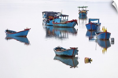 Vietnam, Cam Ranh, Traditional Fishing Boats Reflected In Calm Water