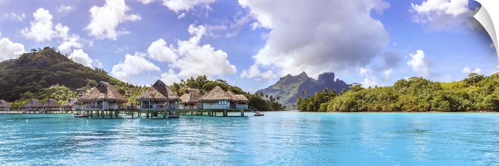 Water bungalows of Hilton resort in the lagoon of Bora Bora, French Polynesia.