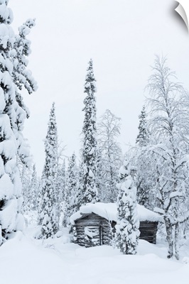 Wooden Hut Covered With Snow At Pallas-Yllastunturi National Park, Finland