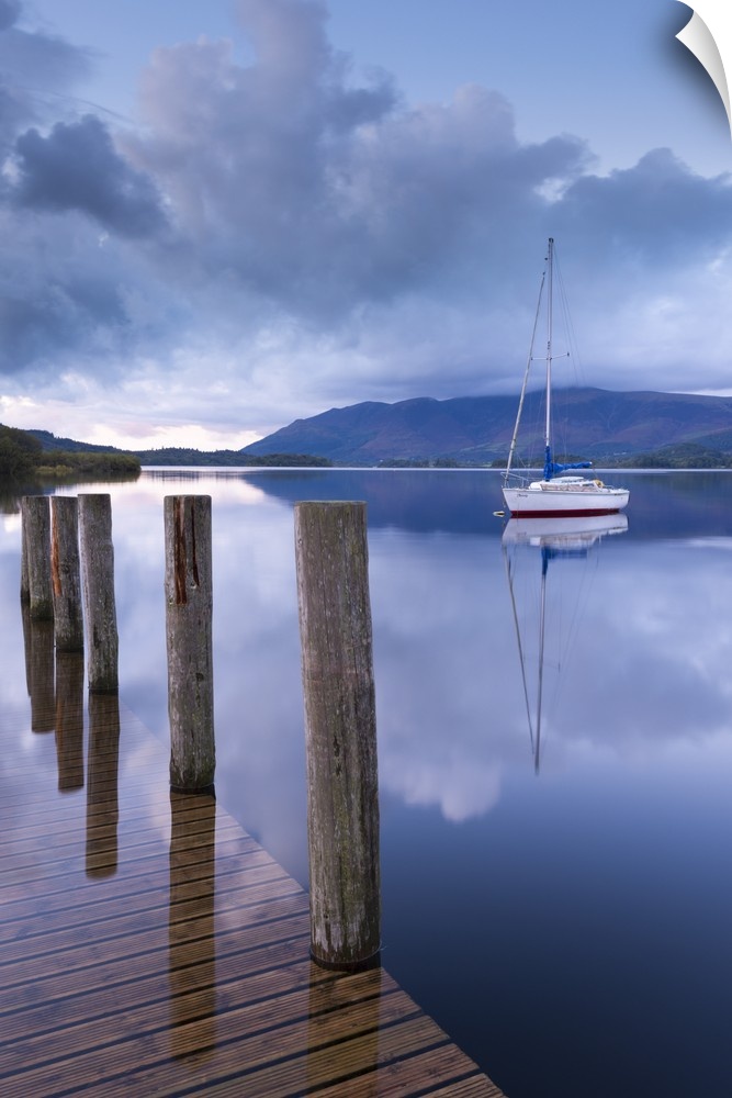 Yacht moored near Lodore boat launch on Derwent Water, Lake District, Cumbria, England. Autumn (September)