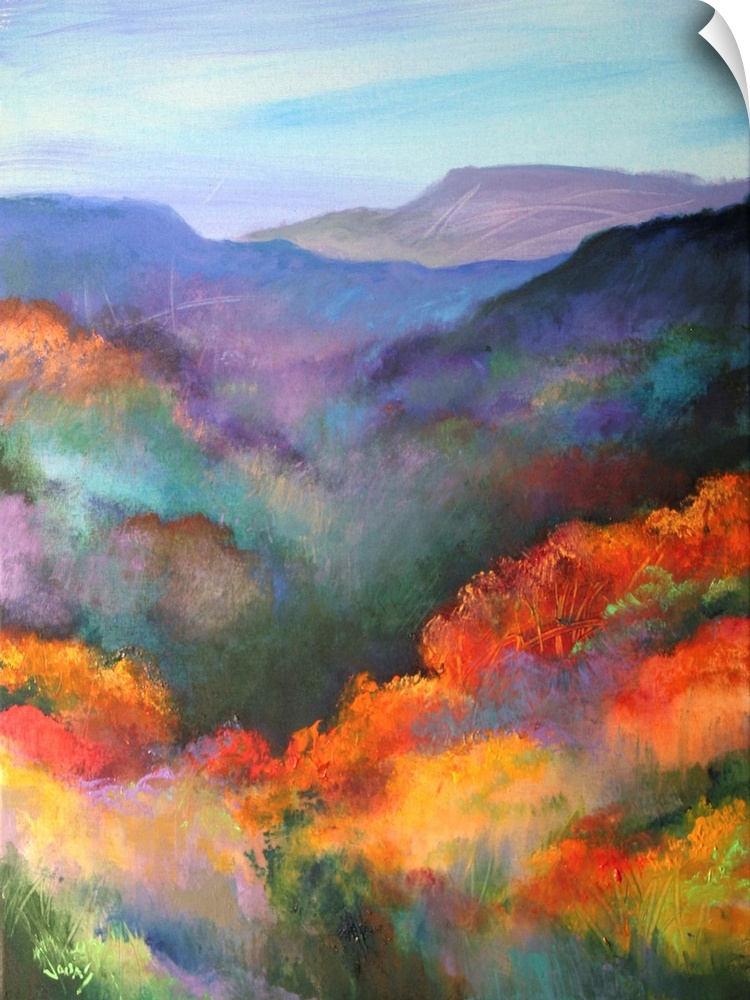 Tall canvas painting of brightly colored trees with mountains in the distance.