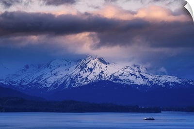 A Lone Fishing Boat Pulls Into Homer Bay at Sunrise; Homer, Alaska