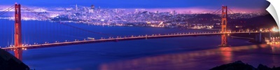 Golden Gate Brige with Bay Bridge Illuminated in Background